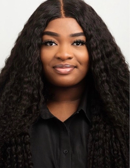 Headshot of Ivana Okaro (Elle)